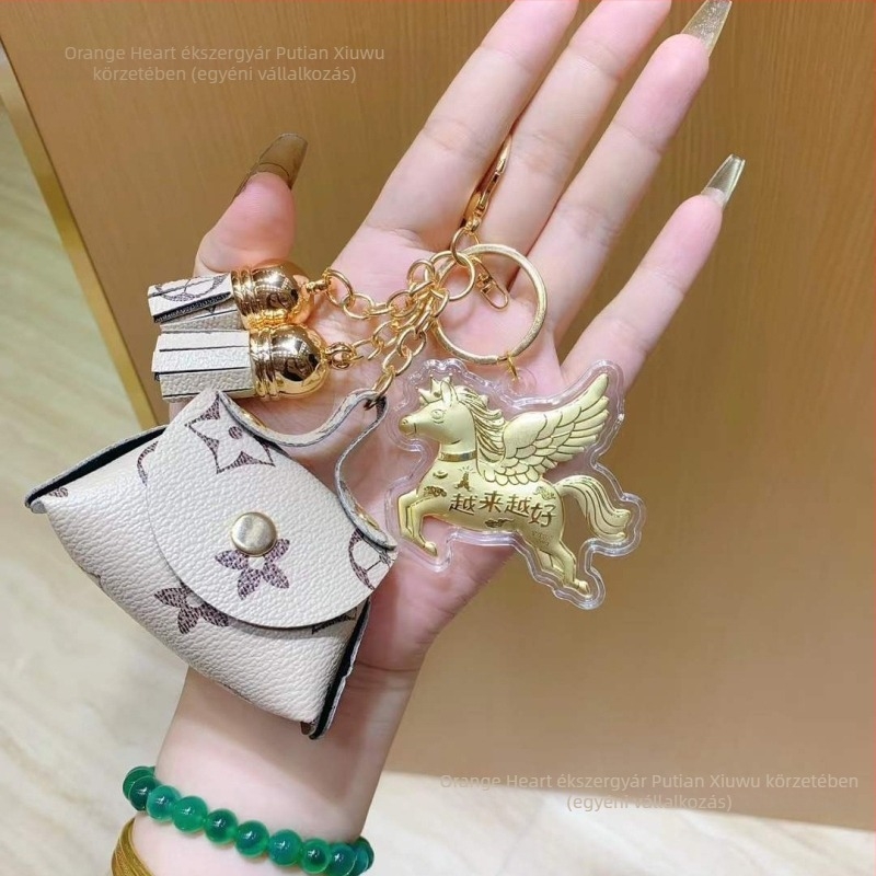 Kulcstartó Nothing - aranytartalmú, modern minimalist stílus, ideális üzleti ajándék