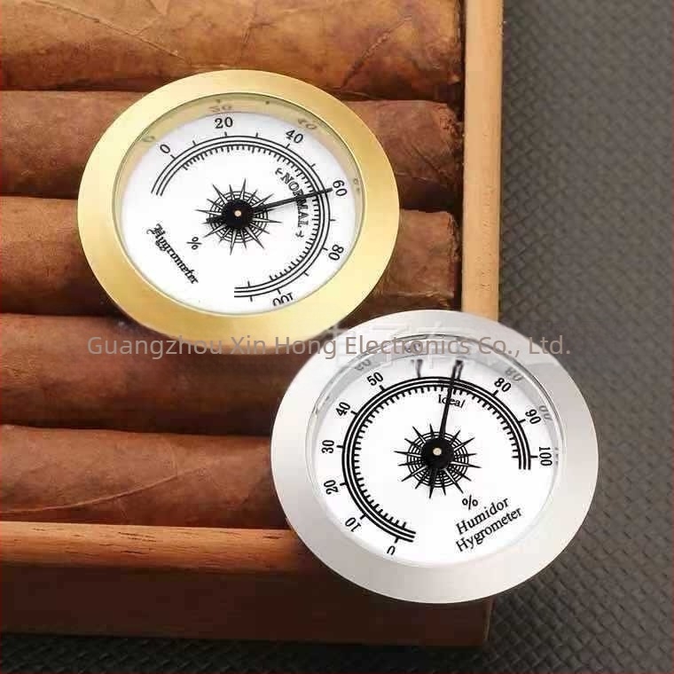 Pointeres hőmérséklet- és páratartalom-mérő humidorokhoz és hangszeres tokokhoz; páratartomány 0–100% RH; hőmérséklet-tartomány -30–60°C; páratartalom pontosság ±5%; hőmérséklet pontosság ±1°C.