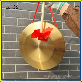 Rézötvözetből készült gong nyomtatott katasztrófa-figyelmeztető felirattal, árvízvédelmi és vészhelyzeti felhasználásra