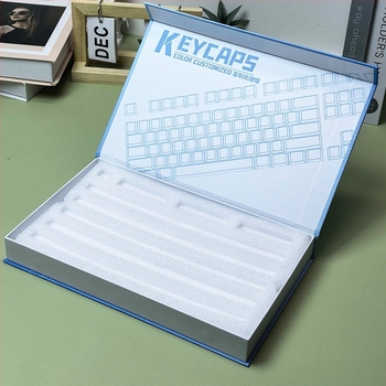 Billentyűsapkák csomagoló doboza gyöngyház pamut betéttel, univerzális illeszkedés, papírdoboz, tartalmaz két darab gyöngyház pamut betétet