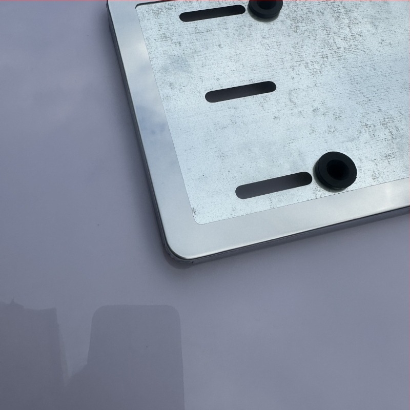 Rozsdamentes acél rendszámtábla keret, általános kompatibilitás, alkatrész szám 003, kód 06