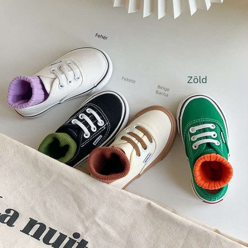 Gyerekeknek készült slip-on vászoncipő — vászon felsőrész, gumírozott talp, középmagas fazon, egyszínű minta