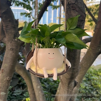 Gyantából készült növénycserép, függő mosolygós arcú dísz – modern otthon és kert dekoráció
