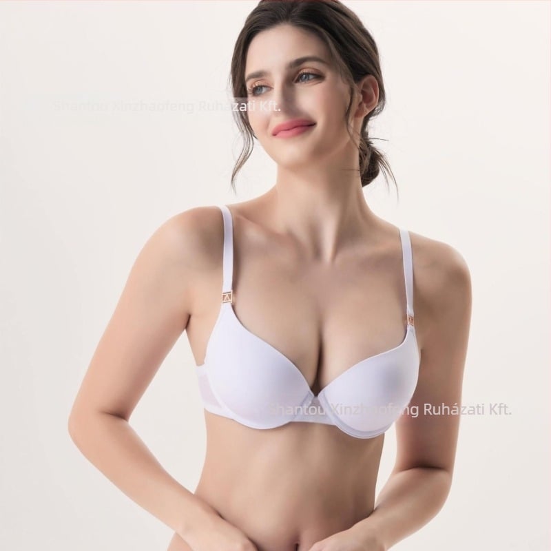 Nylon melltartó állítható push-up, légáteresztő oldalsó összegyűjtés, középméretű formázott kosarak, fix dupla vállpántok, hátsó dupla kapocs