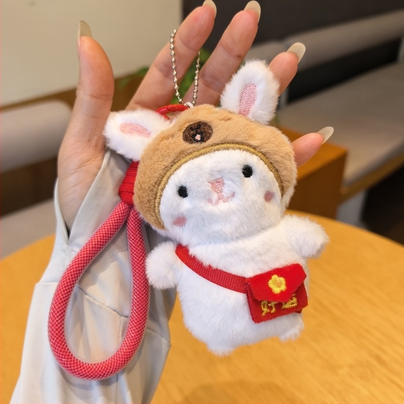 Csörgős plüssnyuszi táskadísz és kulcstartó — rajzfilmszerű, aranyos motívumokkal