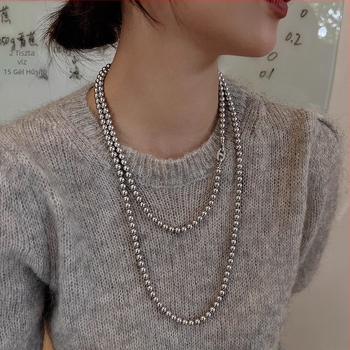 Hosszú pulóverlánc üveg és lazurit anyaggal, golyó lánccal, kerület 81 cm felett, fityegő nélkül, 2025 tavaszi kiadás