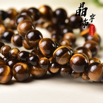 Szabad gyöngyök tigrisszem kőből, kör alakúak, vágás és csiszolás, eredet Lianyungang
