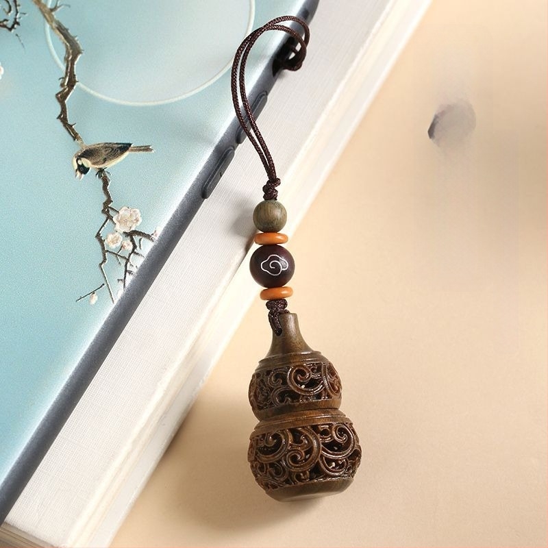 Fém kulcstartó medállal; nem ajándék; IP-engedély nélkül.