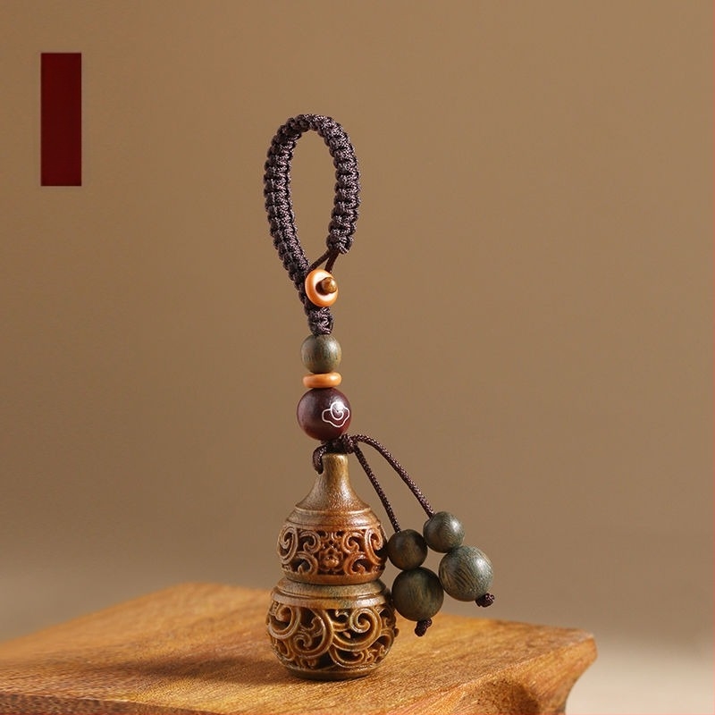 Fém kulcstartó medállal; nem ajándék; IP-engedély nélkül.