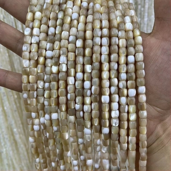 Szabad gyöngyök tengeri kagylóhéjból, hengeres gyöngyök, kézzel polírozott, könnyű luxus stílus, nemes mintázat (Anyag: kagylóhéj; Feldolgozás: kézi polírozás; Stílus: könnyű luxus; Mintázat: nemes; Forma: hengeres)