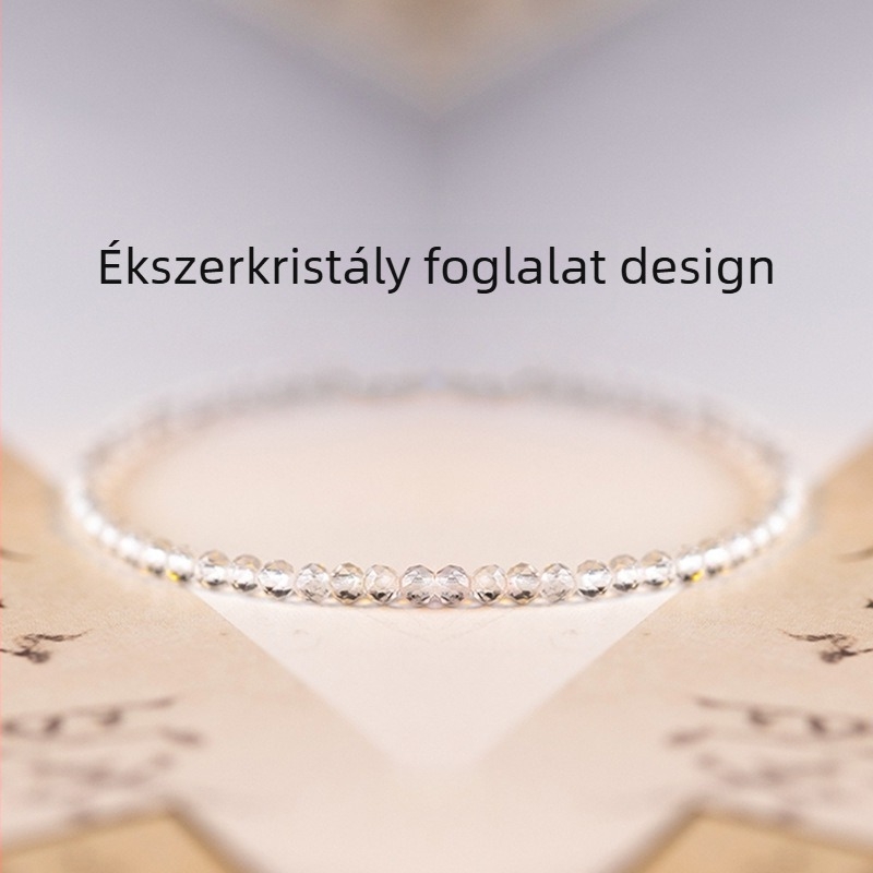 Kristályos karkötő, oldalsó kövek nélkül, elasztikus zsinórral, díszdobozos csomagolás