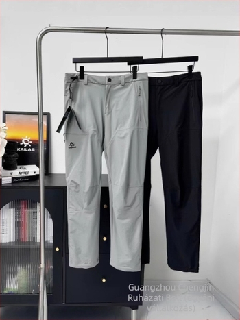 Kailas Softshell sportnadrág hímzett logóval, szél- és vízálló, légáteresztő, több zseb, enyhén bővülő szár, középmagas derék, elöl gombos zárás