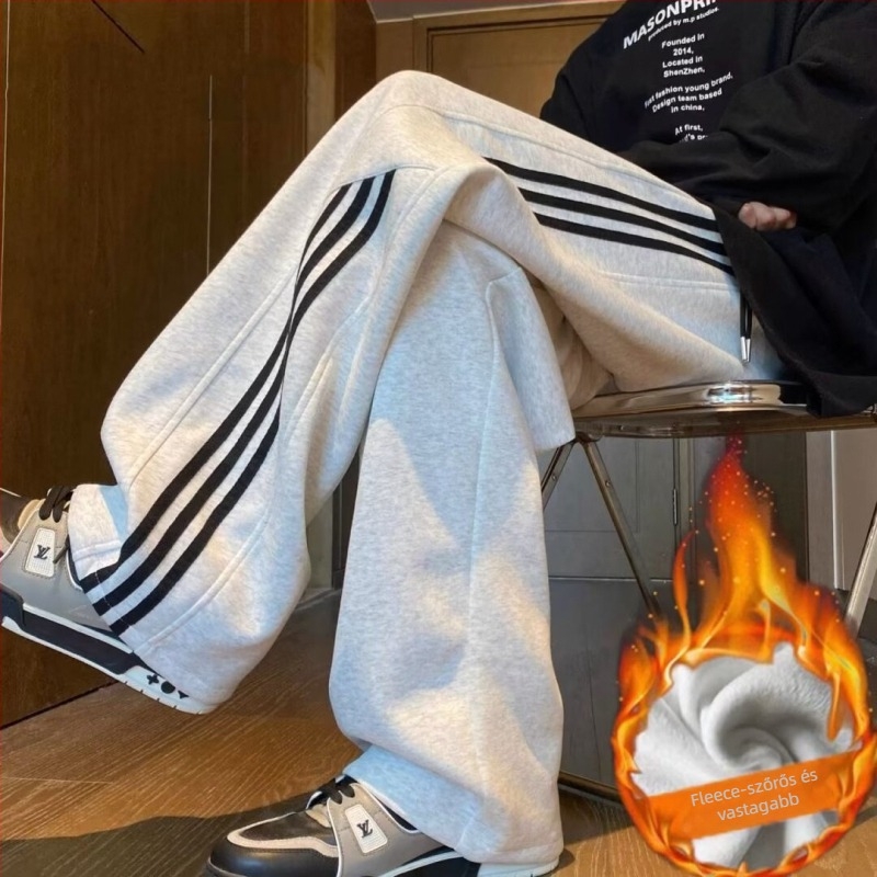 Férfi téli sportos nadrág, egyenes szabás, csíkos mintázat, velúr anyagú, fleece-béléssel, középmagas derék