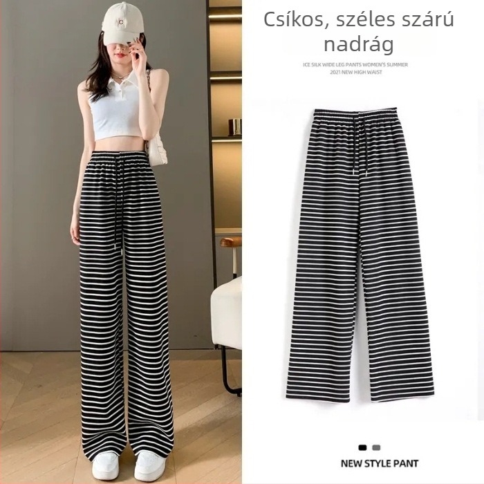 Női fekete-fehér csíkos casual nadrág, magas derék, karcsúsító fazon, egyenesből széles szárú, padlóra érő.