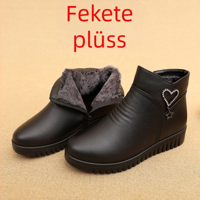 Téli női rövid bőrcsizma, belső plüss béléssel, kerek orrú, alacsony sarkú, poliuretán talppal.