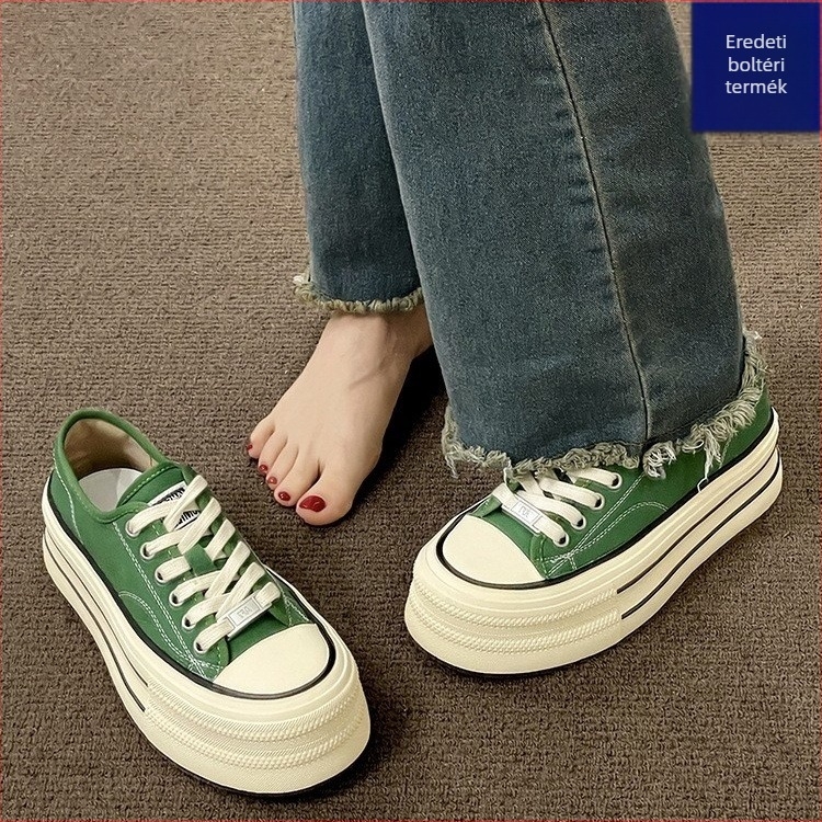 Női vászoncipő injekciós formájú műanyag talppal és elől kötős zárással