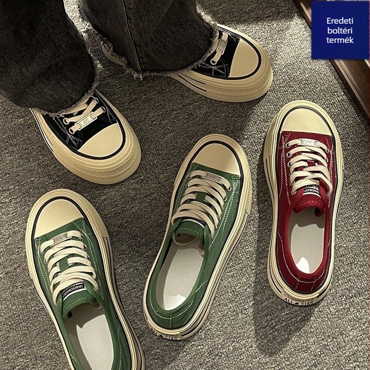 Női vászoncipő injekciós formájú műanyag talppal és elől kötős zárással