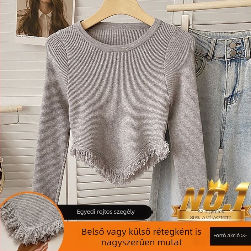 Női kötött crop top bojtokkal, hosszú ujjú, aszimmetrikus szabású, kerek nyak