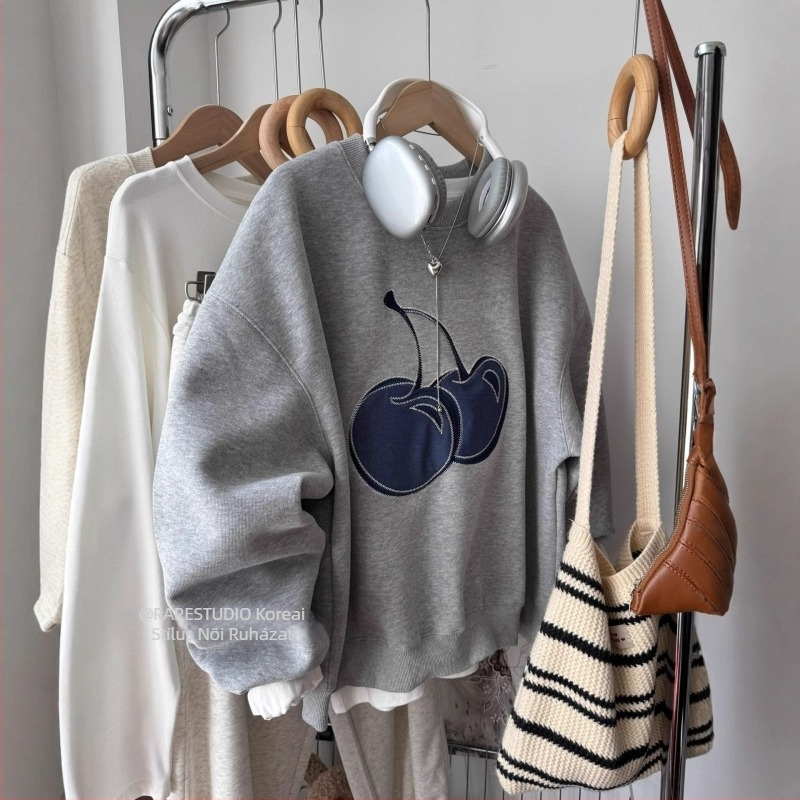 Női kapucnis fleece pulóver geometriás mintával, laza szabás, hosszú ujjú, kerek nyakú, poliészter anyag