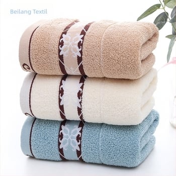 Pamut jacquard arc- és kéztörölköző, 32S fonal, hosszúszálas pamut, puha és nedvszívó, 95% pamut tartalom, súly 100–120 g
