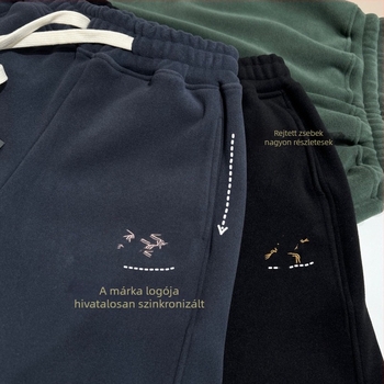 Szélálló fleece-belelt sportos nadrág, lazán szabott, középmagas derék, pamutkeverék anyag