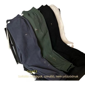 Szélálló fleece-belelt sportos nadrág, lazán szabott, középmagas derék, pamutkeverék anyag