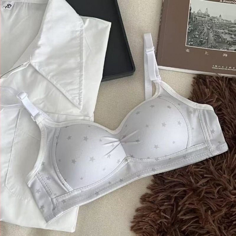 Formázó melltartó virágmintás nylon anyagból, vékony moldált kosarak, rögzített dupla vállpántok, hátul három sor kapocs