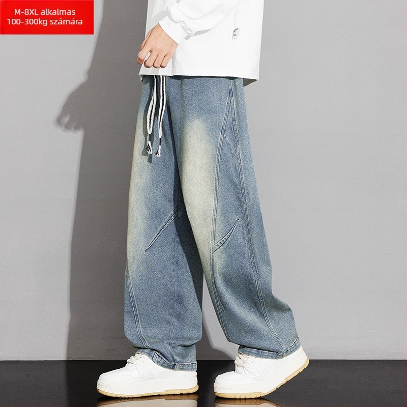 Panel dizájnnal ellátott farmernadrág, széles szabású egyenes fazon, középmagas derék, zsinóros zárás, pamut-keverék (57% pamut / 25,3% poliészter / 17,7% regenerált cellulóz rost)