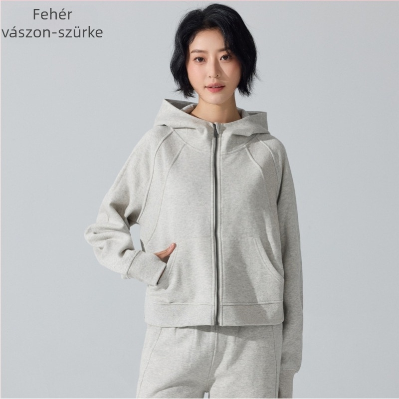 Női kapucnis pulóver cipzárral, deréktáji hossz, laza szabás, pamut-poliészter keverék anyag, melegen tart