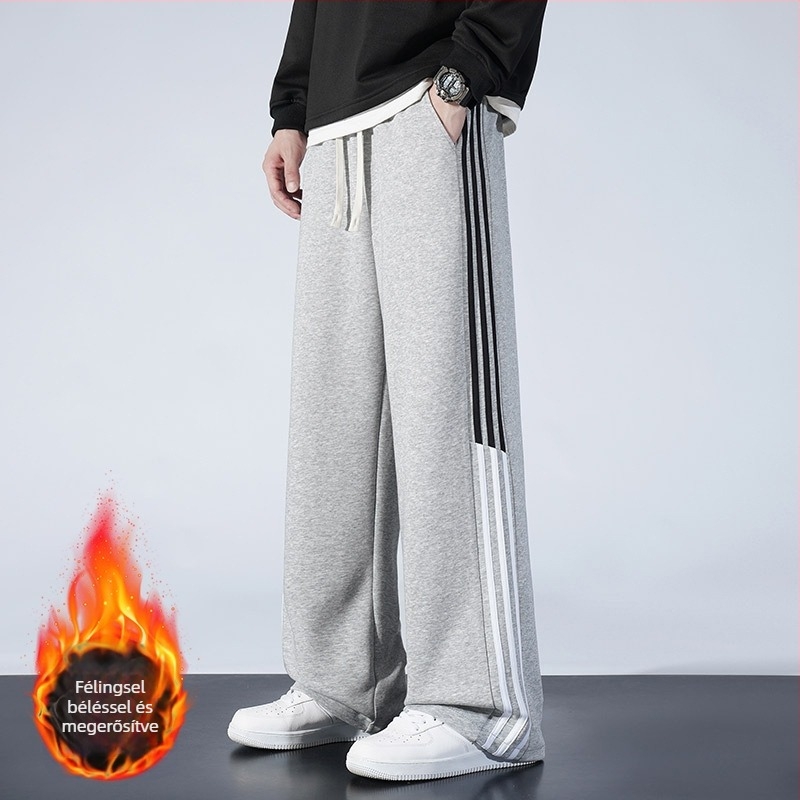 Pamutból készült fleece-belelt sportnadrág egyenes szabású, csíkos mintázat, középmagas derék, öv és fűzőzárás