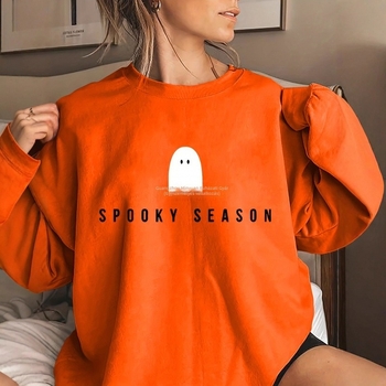 Kapucnis pulóver, szellemes mintával, poliészter anyag, vastag anyag, laza szabás.