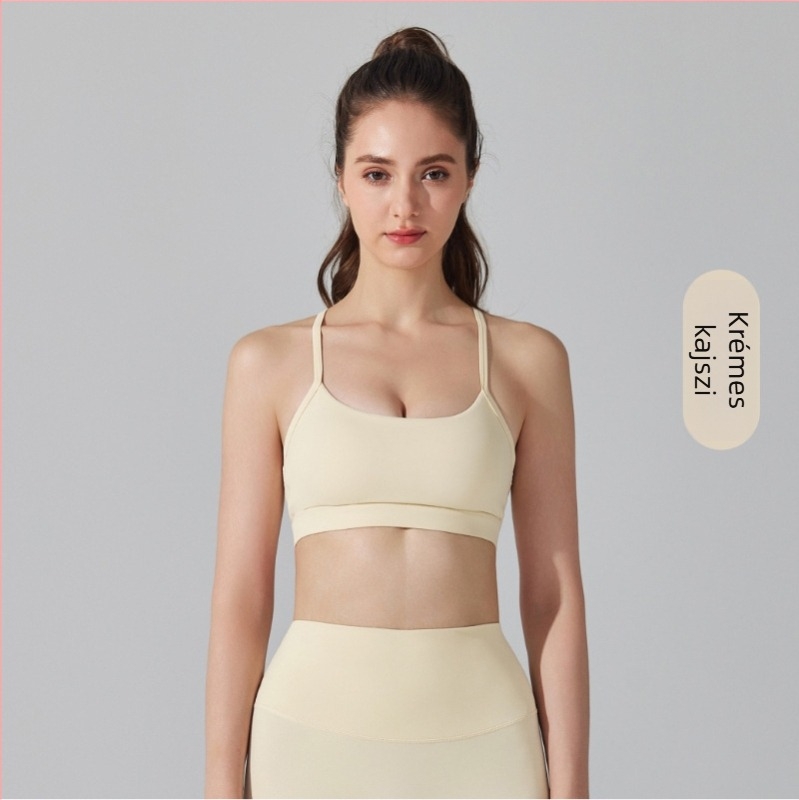 Női sportmelltartó nude érzetű, 81% nylon/poliamíd, bélés 19% spandex, teljes kosár, vékony formázott kosár, vállpántok Y-Back, minden szezonban