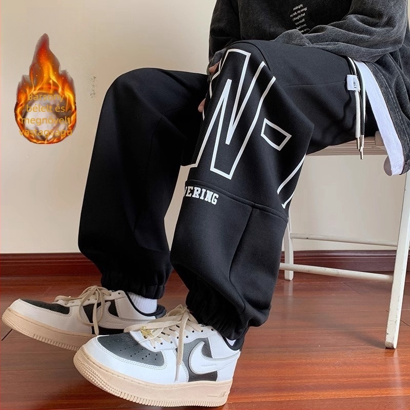 Férfi fleece‑szálas sportnadrág laza szabás, középső derék, húzózsinóros zárás, bokához illeszkedő mandzsetta, poliészter keverék