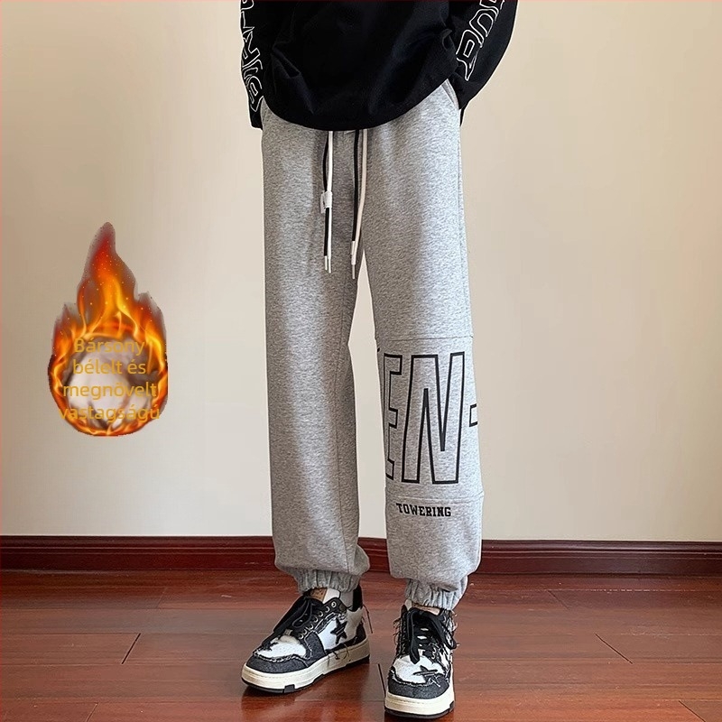 Férfi fleece‑szálas sportnadrág laza szabás, középső derék, húzózsinóros zárás, bokához illeszkedő mandzsetta, poliészter keverék