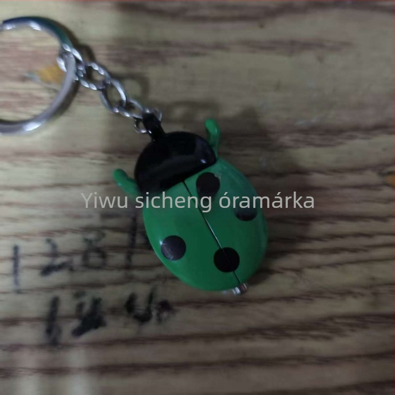 Katicabogár motívumú kvarc zsebóra, fém tokkal, organikus üvegből készült tükör, mutató kijelző, testreszabható