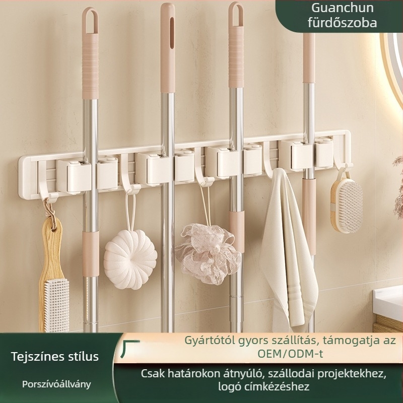 Crown Toon falra szerelhető mop- és seprűtartó, anyag: űr-alumínium és műanyag, fúrás nélküli szerelés, seprűnyél tárolás, spray-műanyag felület, súly 0,3 kg