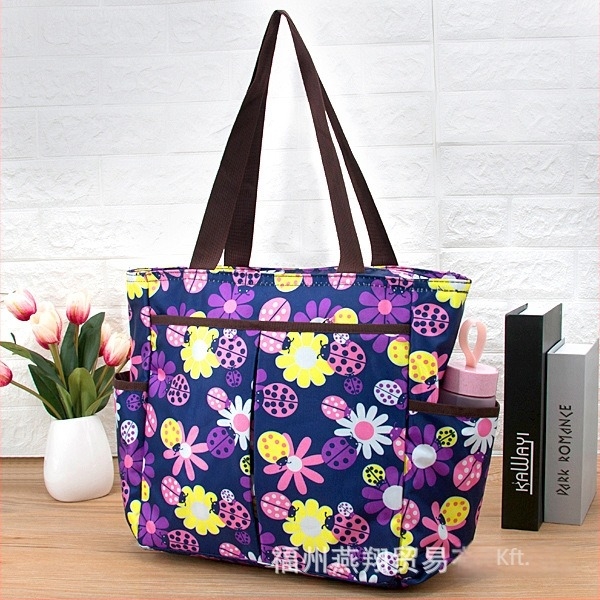 Válltáska, multifunkcionális és vízálló, virágos mintázat, poliészter anyag