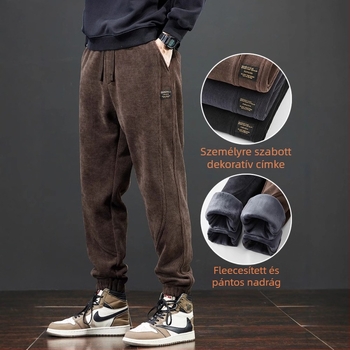 Corduroy anyagú sportos nadrág, vastag anyag, középmagas derék övvel, keskenyedő szabású, dekoratív zsebek