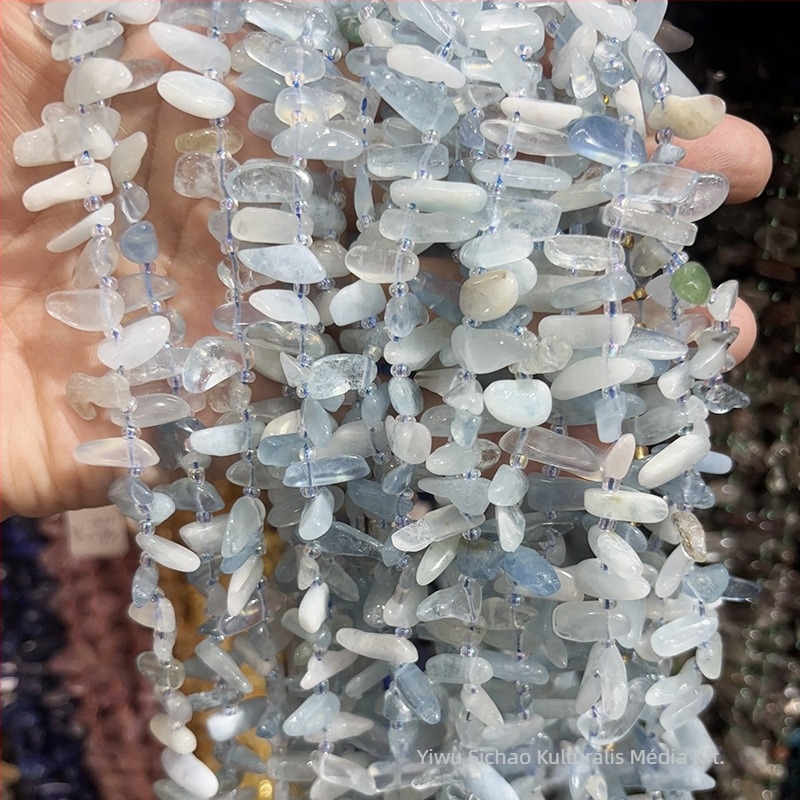 Természetes kőből készült szabad gyöngyök — vízcsepp alak, farkasfog formájú, oldalról fúrt, kapoccsal