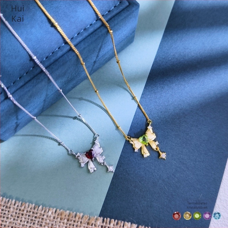 S925 ezüst masni alakú nyaklánc köves díszítéssel, többszintű keresztlánccal, szív alakú köves medállal