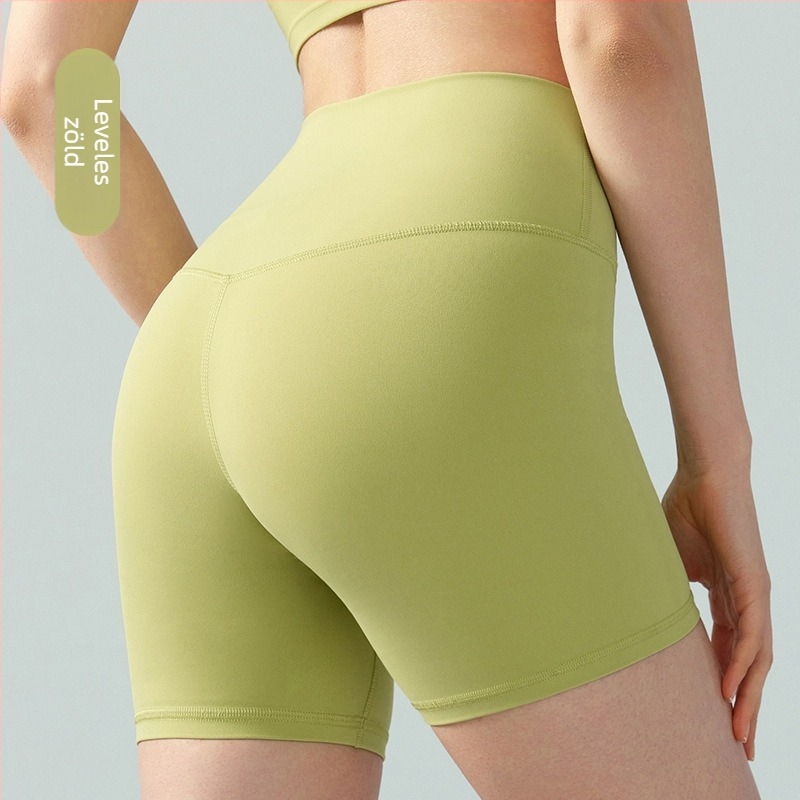 Női jóga rövidnadrág magas derekú, farizom-emelő dizájn, légáteresztő anyag, 80% nylon, 20% Lycra, 4/4 hossz, slim fit.