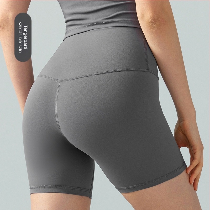 Női jóga rövidnadrág magas derekú, farizom-emelő dizájn, légáteresztő anyag, 80% nylon, 20% Lycra, 4/4 hossz, slim fit.