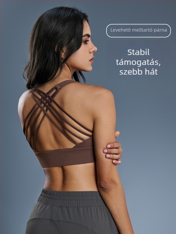 Női magas támogatású keresztpántos sportmelltartó push‑up effektussal, teljes kosár, közepes formázású kosarak, rögzített dupla vállpánt; nylon-elasztán keverék.
