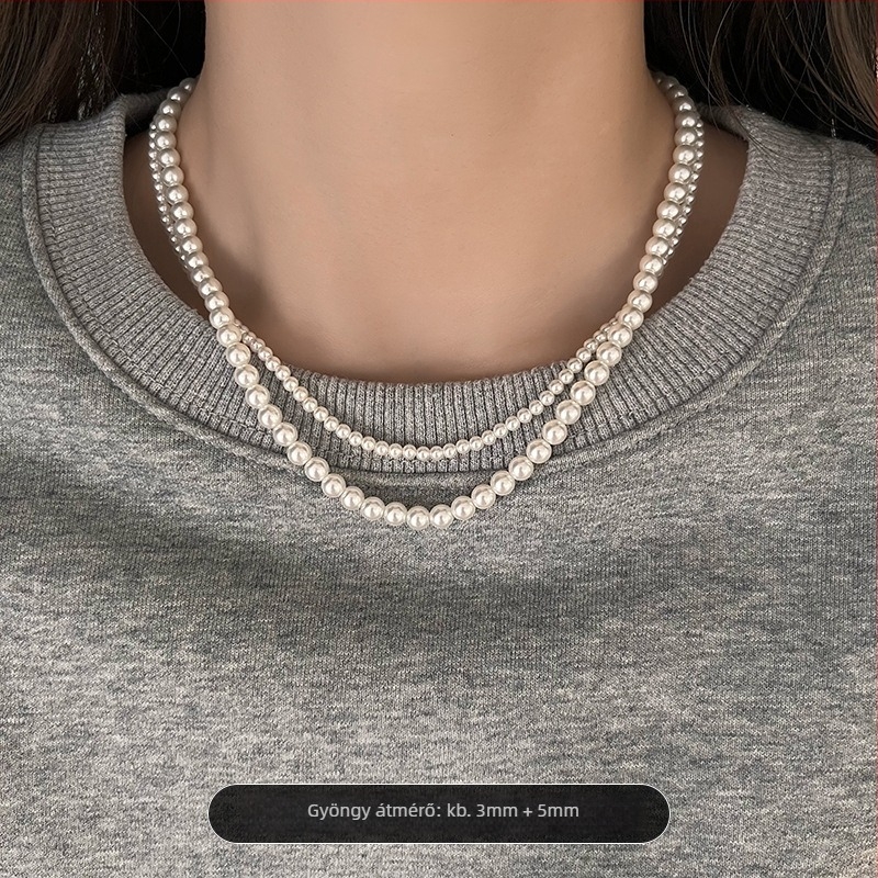 Gyöngy nyaklánc gyöngyház medállal, U-formájú kialakítás, Seiko kezelés, egyszerű, texturált, könnyed luxus stílus