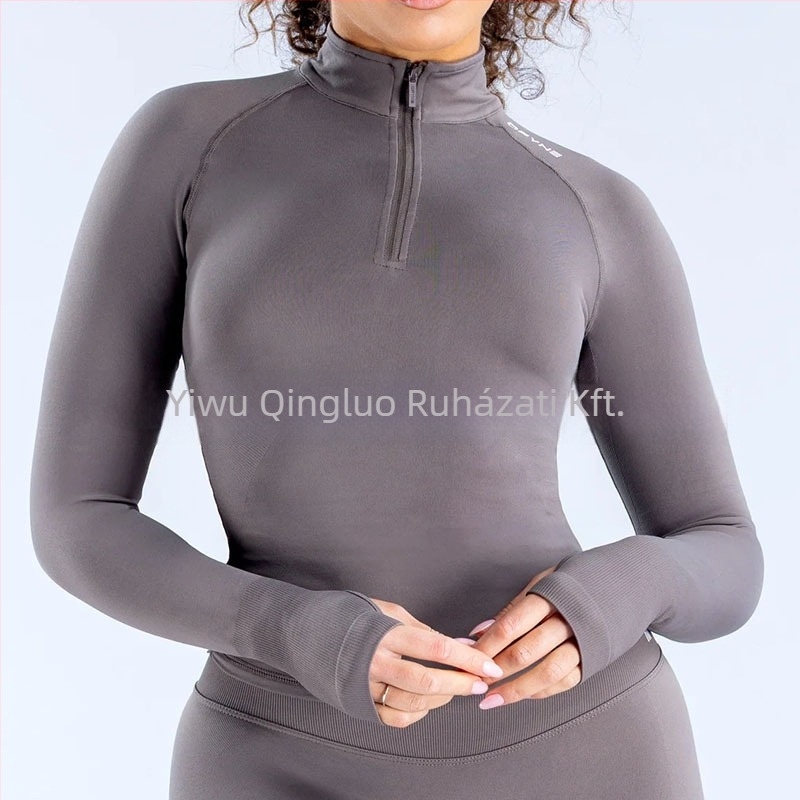 Jóga dzseki hosszú ujjú, szoros szabású, derékig érő hossz, fél zip és álló gallér, nedvesség-elvezető anyag nylon-spandex