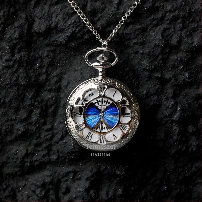 Mozgó, valódi pillangó-példányos zsebóra, ideális ajándék lányoknak és barátnőknek (Elektronikus működés; 35 m vízállóság; szilikon tokkal; kör alakú számlap; ABS üveg)