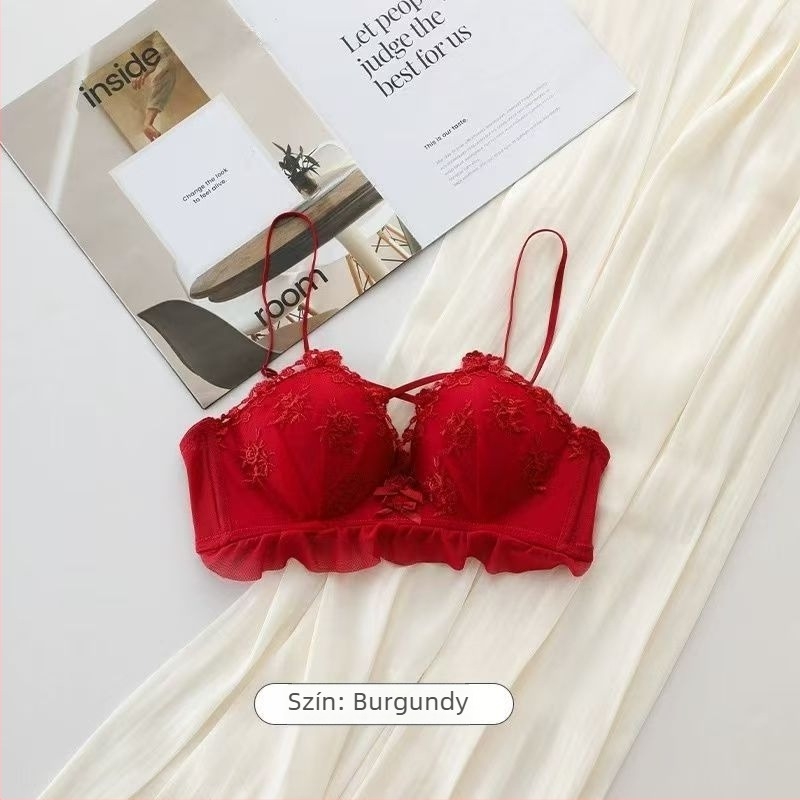 Vezeték nélküli női melltartó finom virágos hímzéssel, formázott kosarak felső része vékony, alsó része vastag, kosár nylon anyagú, bélés elasztán <30%, fix vállpántok, hátul négykapcsos zár