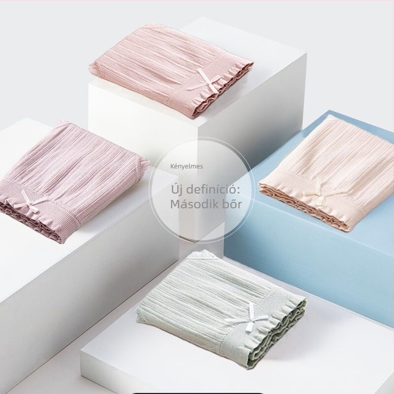 Női középmagasságú alsónemű, légáteresztő antibakteriális nylon, pamut belsővel a zóna crotch-nál, sima szövés, mintázat: egyszínű masnival