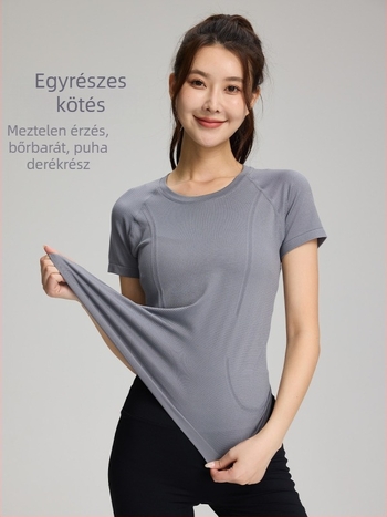 Női seamless tornázó felső, légáteresztő, egy darabos szövésű anyag, nylon 97% spandex 3%, rövid ujjú, karcsú fazon, csípőig érő hossz