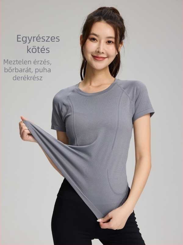 Női seamless tornázó felső, légáteresztő, egy darabos szövésű anyag, nylon 97% spandex 3%, rövid ujjú, karcsú fazon, csípőig érő hossz